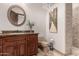 Bathroom featuring granite counters, bowl sink, toilet and a tiled walk-in shower with a built-in bench at 10638 E Hedgehog Pl, Scottsdale, AZ 85262