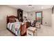 Shared bedroom space with matching twin beds, wooden accents, and natural light at 10638 E Hedgehog Pl, Scottsdale, AZ 85262