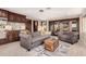 Spacious living room with comfortable seating, wet bar and entertainment area at 10638 E Hedgehog Pl, Scottsdale, AZ 85262