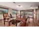 Entertainment room boasts wood floors, mountain views, and cozy seating at 10638 E Hedgehog Pl, Scottsdale, AZ 85262