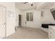Bedroom space with unique architectural niche, perfect for relaxing and enjoying the view at 1152 W Horseshoe Ave, Gilbert, AZ 85233
