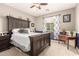 Bedroom with a plush bed, decorative accents, and a well-lit interior at 1152 W Horseshoe Ave, Gilbert, AZ 85233