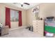 Bedroom featuring a large window, and neutral tones at 1152 W Horseshoe Ave, Gilbert, AZ 85233