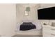 The home has a cozy nook with built in bed and sleek, modern furniture at 1152 W Horseshoe Ave, Gilbert, AZ 85233