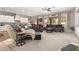 Open-concept living room with neutral colors, plush seating, and a cozy chaise lounge at 1152 W Horseshoe Ave, Gilbert, AZ 85233