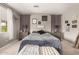 Cozy bedroom features soft textures, a calming color palette, and plush bedding for a relaxing retreat at 1152 W Horseshoe Ave, Gilbert, AZ 85233