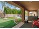 Relaxing covered patio with ceiling, and outdoor living area at 1152 W Horseshoe Ave, Gilbert, AZ 85233