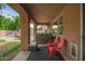 Relaxing covered patio with ceiling, and outdoor living area at 1152 W Horseshoe Ave, Gilbert, AZ 85233