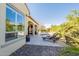 Serene backyard with comfortable lounge chairs next to a pool and covered patio at 1488 E Sweet Citrus Dr, Queen Creek, AZ 85140