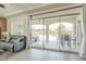 Inviting living room with large sliding doors leading to outdoor patio space for seamless indoor-outdoor living at 1488 E Sweet Citrus Dr, Queen Creek, AZ 85140