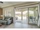 Inviting living room with large sliding doors leading to outdoor patio space for seamless indoor-outdoor living at 1488 E Sweet Citrus Dr, Queen Creek, AZ 85140