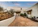 Desert home featuring a stone walkway leading to the covered front entrance at 16410 E Leo Dr, Fountain Hills, AZ 85268