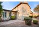 Charming backyard featuring a patio area, manicured bushes, and a serene outdoor seating space to enjoy at 17991 N 95Th St, Scottsdale, AZ 85255
