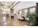 An open concept formal dining room with a chandelier and natural light, features seating for six at 17991 N 95Th St, Scottsdale, AZ 85255