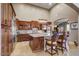 Gourmet kitchen with custom cabinetry, granite countertops, stainless steel appliances, and a spacious center island at 17991 N 95Th St, Scottsdale, AZ 85255
