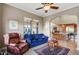 Comfortable seating in a sunlit living room connected to an eat-in kitchen at 17991 N 95Th St, Scottsdale, AZ 85255