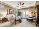 Elegant bedroom with a king bed, ensuite bathroom, and private outdoor access at 17991 N 95Th St, Scottsdale, AZ 85255