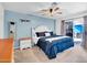 Primary bedroom with a queen sized bed and access to a balcony at 1801 E Hearn Rd, Phoenix, AZ 85022