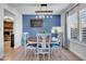 Charming dining area with unique decor and ample natural light at 1801 E Hearn Rd, Phoenix, AZ 85022