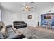 Open-concept living area with views to the dining room and lots of natural light at 1801 E Hearn Rd, Phoenix, AZ 85022