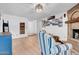 Bright living room featuring a brick fireplace and stylish decor at 1801 E Hearn Rd, Phoenix, AZ 85022