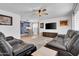 Spacious living room with comfortable seating and a view into the dining area at 1801 E Hearn Rd, Phoenix, AZ 85022