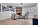 Cozy living room with a brick fireplace and two comfortable chairs at 1801 E Hearn Rd, Phoenix, AZ 85022