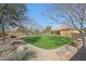 A lush green backyard with gravel at 2050 N 144Th Dr, Goodyear, AZ 85395
