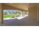 A large covered patio overlooks the backyard at 2050 N 144Th Dr, Goodyear, AZ 85395