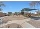 Neighborhood playground features swings, slides, play structures, and a covered picnic area at 2050 N 144Th Dr, Goodyear, AZ 85395