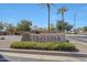 Travesia community entrance sign with stacked stone accent and desert landscaping at 2050 N 144Th Dr, Goodyear, AZ 85395