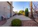 Large backyard featuring mature landscaping and a concrete patio at 21041 N 61St Dr, Glendale, AZ 85308