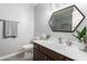 This updated bathroom features modern fixtures, hardware, and design at 21041 N 61St Dr, Glendale, AZ 85308