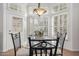 Bright breakfast nook with table and window shutters at 21041 N 61St Dr, Glendale, AZ 85308