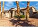 Single story home with desert landscaping, a tile roof, and a three car garage at 21041 N 61St Dr, Glendale, AZ 85308