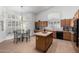 Kitchen with an island and breakfast nook at 21041 N 61St Dr, Glendale, AZ 85308