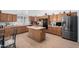Spacious kitchen with modern appliances and center island at 21041 N 61St Dr, Glendale, AZ 85308