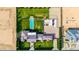 Top-down aerial view of home showcasing rectangular pool and manicured lawn at 21962 E Diana Way, Queen Creek, AZ 85142