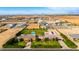 Extensive estate featuring luxurious pool area, sprawling lawn, and manicured landscaping at 21962 E Diana Way, Queen Creek, AZ 85142