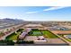 Expansive estate featuring a sparkling pool and well-manicured grounds at 21962 E Diana Way, Queen Creek, AZ 85142