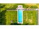 View of long, rectangular pool area surrounded by lush green lawn at 21962 E Diana Way, Queen Creek, AZ 85142