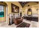 Bathroom featuring a copper tub, stone floors, and a decorative chandelier above at 21962 E Diana Way, Queen Creek, AZ 85142