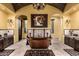 Elegant bathroom with a copper soaking tub, ambient lighting, and stylish tile work at 21962 E Diana Way, Queen Creek, AZ 85142