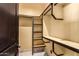 Walk-in closet with custom shelving and ample storage at 21962 E Diana Way, Queen Creek, AZ 85142
