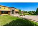 Beautiful home featuring a stone entryway, manicured lawn and landscaped yard at 21962 E Diana Way, Queen Creek, AZ 85142