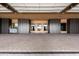 Spacious garage with ample storage cabinets and paver flooring, offering a clean and organized space at 21962 E Diana Way, Queen Creek, AZ 85142