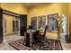 Bright office with custom desk, rich textures, and natural light at 21962 E Diana Way, Queen Creek, AZ 85142
