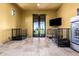 Bonus room with tile floors, dog kennels and an exterior view at 21962 E Diana Way, Queen Creek, AZ 85142