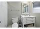 Cozy bathroom with white vanity, updated fixtures, and shower/tub combo at 2256 S Noche De Paz --, Mesa, AZ 85202