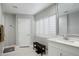 Bright bathroom features tiled floors, and a modern vanity with quartz countertops at 2256 S Noche De Paz --, Mesa, AZ 85202